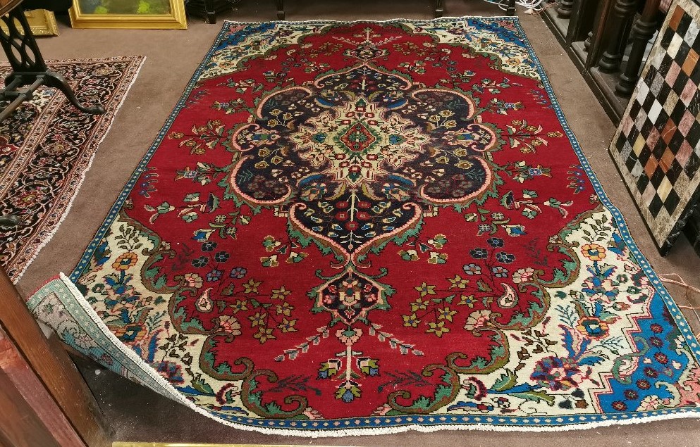 Floral Pattern Iranian Carpet, Tabriz origin, with blue/green borders, large medallion, 1.9 x 2.8m