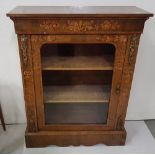 Edw. Marquetry Inlaid Walnut Pier Cabinet with brass mounts and a single glass door enclosing 2