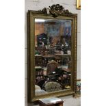 Early 20thC Gilt Framed Wall Mirror, a shell style pediment over a reeded bordered frame, original