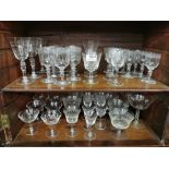 2 shelves of engraved window and champagne and sherry glasses