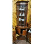 Compact Mahogany Corner Cabinet, with a bowed glass door (slight crack), over a corner base with a