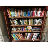 4 shelves of books and 2 boxes of books – hardback and softback novels, childrens annuals etc