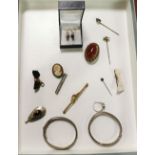 Group of jewellery – 2 silver bracelets, brooches, a cameo, stick pins and pendants, etc (11