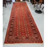 A Bokhara Floor Runner, red ground (label of James Barclay), 3.1m l x 1m w &a smaller Bodkhara