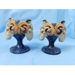 Matching Pair of Continental Majolica Vases in the form of Goats Heads, on blue painted stems,