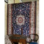 Blue ground Kashmir Rug, with a sharbaz medallion design, 2.3m x 1.6m