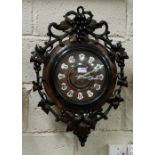 Black Forest French Movement Vineyard Clock, with applied enamelled Roman Numerals to the face,