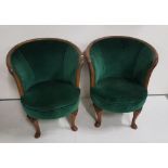 Matching pair of mahogany framed low sized Victorian Tub Chairs, green velvet padded seat and back