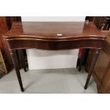 19thC Mahogany line inlaid serpentine fronted fold-over Card Table on turned tapering reeded