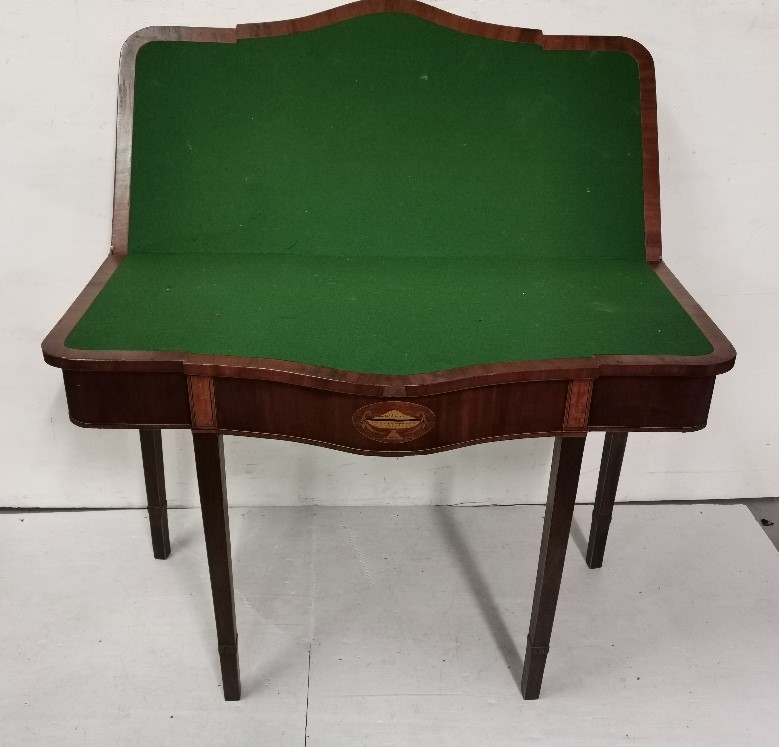 A large Inlaid Mahogany Foldover Card Table, with a serpentine front over tapered legs, with a green - Image 2 of 2