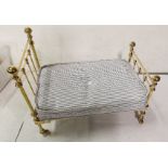 Miniature Replica of a Victorian Brass Bed, with a base and a blue and white traditional mattress,