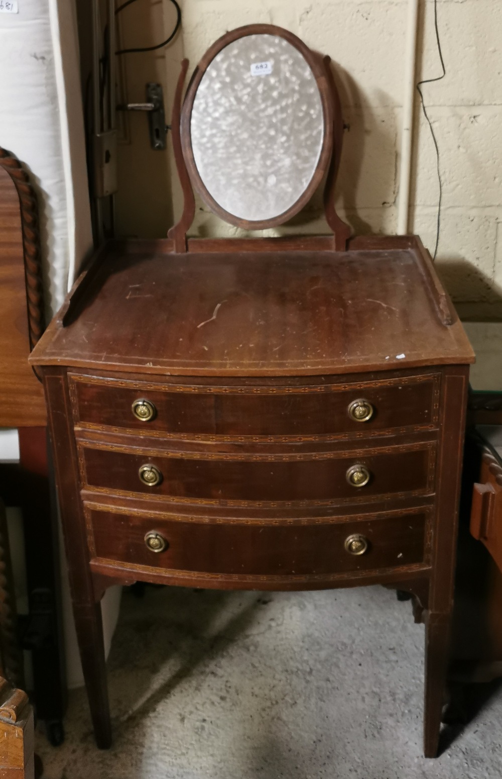 1950’s Mahogany Reproduction 3 Drawer and bow-fronted dressing Table, with an oval adjustable mirror