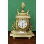 French Onyx Timepiece Mantle clock with scrolled side mounts and brass toes, 35cm h x 25cm w