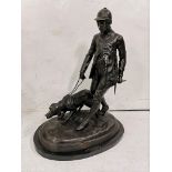 Bronze Model of a Hunter with working Dog, on an oval marble base, 66cmH x 53cmW