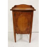 Late 19thC Satinwood Bedside Cabinet, with a bow front and green floral inlay, tapered legs, gallery