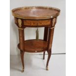 French Style oval top decorative Occasional Table, with brass gallery, over a drawer and mask-shaped