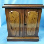 Late 19thC Walnut Collectors Cabinet, two panelled doors enclosing 3 drawers with brass handles,