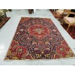 Red Ground Persian Tabriz Carpet, with a unique floral red design, 2.83m x 1.88m