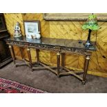 Large carved giltwood finish Console Table with a black marble top (1.95W x 47D x 82cmH) and an