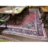 Large red ground Persian Mashad Carpet, floral medallion design, 3.8 x 2.8m