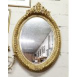 Ornate Oval-Shaped Gilt Framed Wall Mirror with decorative borders and finial, 116cm h x 78 cm h