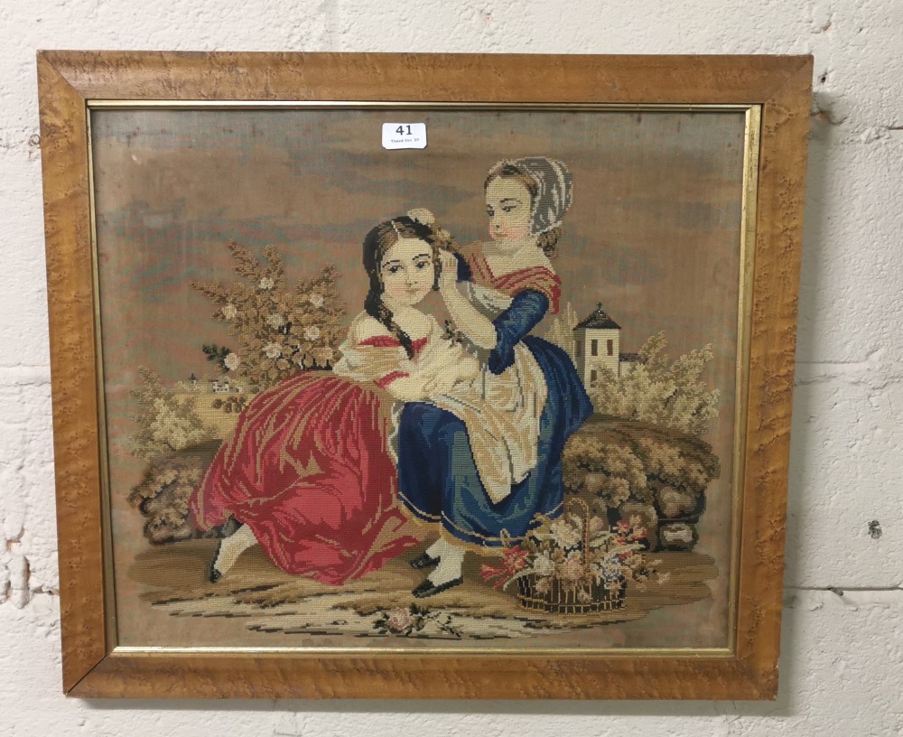19thC needlepoint, girls braiding hair, 52 x 60cm, in a maple frame