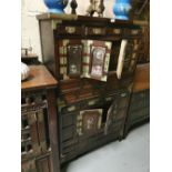 Early 20thC Japanese Cabinet, with 8 small drawers and bi-folding upper glass plated doors, over a