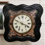 French Vineyard Wall Clock, with a shell appliqué inlay on a serpentine shaped and ebonised clock
