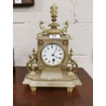French Onyx Timepiece Mantle clock with scrolled side mounts and brass toes, 35cm h x 25cm w