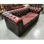 Three-seater Oxblood Red Chesterfield Couch, button back (some wear), 1.9mw x .09md