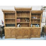 Large Gothic Style 3-part carved Pine Bookcase, with a breakfront centre, open upper shelving over 6