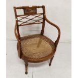 Early 20th Satinwood Elbow Chair, the cross over back nicely inlaid with flowers, bergère seat,