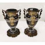 Matching Pair of decorative Porcelain Urns, with gilt mounts and shell decorated base, cherub