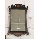 Queen Ann Style Mahogany Framed Wall Mirror, the shaped pediment inlaid with circular satinwood