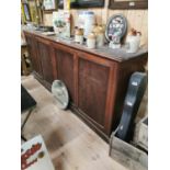 19th C. mahogany shop cabinet with four panel doors.