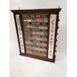 Early 20th C. mahogany and glass Ogden's Cigarettes dispensing cabinet.