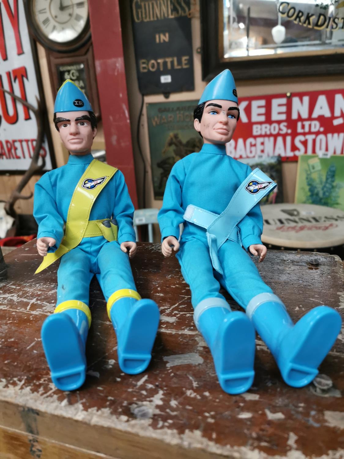 Two vintage Thunder Bird figures.