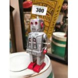 Vintage tin plate wind up Robot toy.