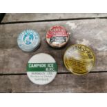 Five vintage ointment tins.