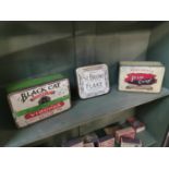 Three tobacco advertising tins.