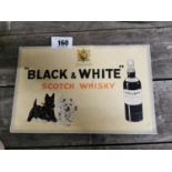 Black & White Scotch Whiskey advertising showcard.