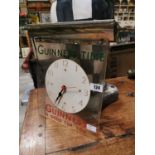 Guinness advertising wall clock.