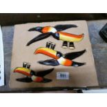 Set of three flying Carlton warea advertising toucans.