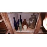 Collection of three cobalt blue bottles and sweet jars.