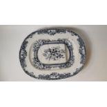 Large 19th. C blue and white joint dish with gravy well.