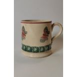 19th. C. spongeware mug decorated with butterflies.