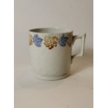 19th. C. spongeware mug decorated with leaves.