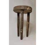 Late 19th. C. pine three legged milking stool. (37 cm H).