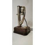 Rare 20th C. chrome and Bakelite telephone {25 cm H}
