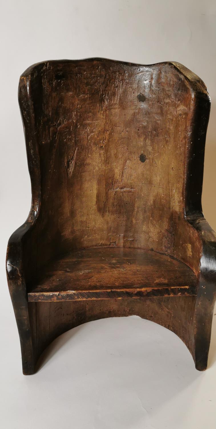 19th. C. child's pine dugout chair.